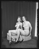 Two women modeling bathing suits for California Apparel Creators Market Week in Los Angeles, Calif., 1948