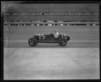 Pete Kreis driving race car number 15 on a race track, 1925-1934