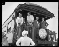 Oscar Solbert and Crown Prince Gustav Adolf of Sweden on a train car platform, Barstow, 1926