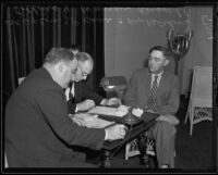 Warren H. Russell questioned by Deputy Coroner J. P. Kane and Arthur Collins about Marion Brown's death, Los Angeles, 1935