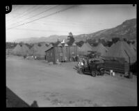 Men and children in a relief camp for flood victims following the failure of the Saint Francis Dam, Santa Clara River Valley (Calif.), 1928