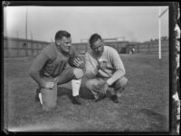 William H. Spaulding, U.C.L.A. football coach, with a football player Homer Oliver Spaulding Field at UCLA, Los Angeles, 1932