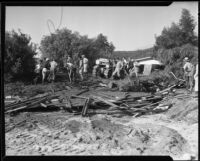 Workers clearing flood debris, La Crescenta-Montrose, 1934