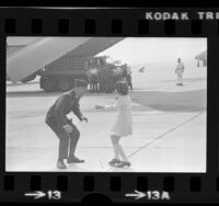 Vietnam POW returnee, Air Force Major Jay C. Hess greeting his daughter at March Air Force Base, Calif., 1973