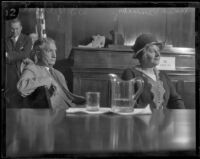 Minnie Kennedy, mother of Aimee Semple McPherson, in court with her attorney W. I. Gilbert, Los Angeles, 1926