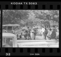 Confrontation between UC Police and UCLA students during UC divestment in South Africa demonstration, Los Angeles, Calif., 1986