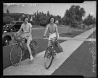 Arletta Sturzenger and Mrs. S. H. Voss riding to market on their bicycles, Los Angeles, 1935