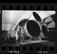 Senator Hubert H. Humphrey viewing mockup of space shuttle during visit to North American Rockwell plant in Downey, Calif., 1972