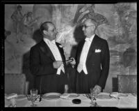 Retiring president of Los Angeles Chamber of Commerce Harry L. Harper with replacement at the Ambassador Hotel, Los Angeles, 1935