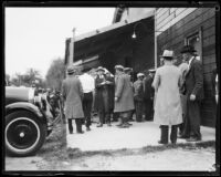 Throngs seeking to identify victims in a temporary morgue after the failure of the Saint Francis Dam and resulting flood, Newhall (Calif.), 1928