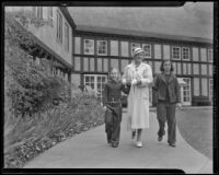 Nancy Schmoele with daughters Nancy and Joane take a morning stroll outside Lake Arrowhead lodge, Lake Arrowhead, 1936