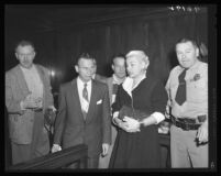 Barbara Payton and attorney Milton Golden (center-left) at the actress' arraignment for check fraud, Los Angeles, 1955