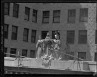 Pacific Mutual Insurance Company crest at the building entrance, Los Angeles, 1920-1939