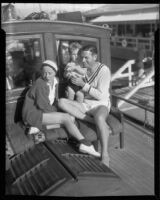 Actors Richard Arlen and Jobyna Ralston Arlen, with son Rickey Arlen, on their boat, Coronado, 1935