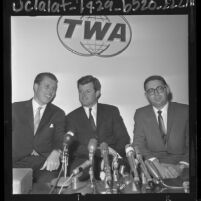 John V. Tunney, Edward "Ted" Kennedy and unidentified man at press conference held before meeting of California Democrats, 1964