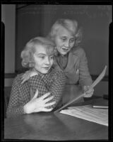 Actresses and sisters Rosetta Duncan and Vivian Duncan pose together, Los Angeles, 1935