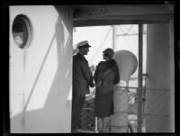 Mrs. Byrd and an unknown crew member stand on the deck of the C. A. Larsen, Los Angeles, 1928