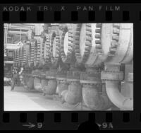 Oil refinery worker checking levers at Atlantic Richfield Company [ARCO] refinery in Carson, Calif., 1973