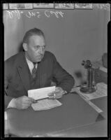 Captain S. J. McCaleb at his desk after his promotion to Chief of the ...