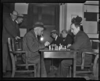 Chess and Checker Club members M. Starker and Holgar Johansen play a game, Los Angeles, 1936