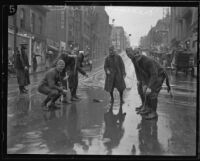 Medinah Shriners patrol unit pretending to fish on a rainy street, Los Angeles, 1936