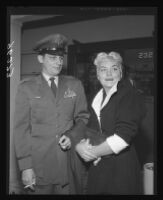 Barbara Payton and former husband Capt. John Payton after custody agreement regarding son, Los Angeles, 1955