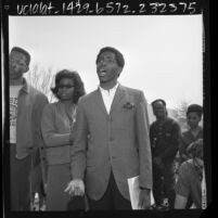 Student Akida Kamani with other students speaking in "Free Speech Area" on Cal State Los Angeles campus, Calif., 1966