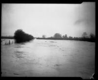 Los Angeles River during rainstorm flooding, Los Angeles County, 1927