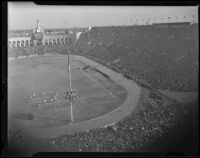 Partial image of the crowd during a Notre Dame vs. USC game at the Coliseum, Los Angeles, 1938