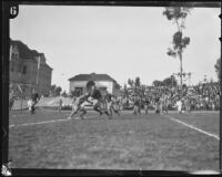 Occidental Tiger runs with the football towards the end zone during ...