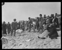 Crowd gathering on the beach from which Aimee Semple McPherson disappeared, Los Angeles, 1926