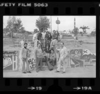 Victory Outreach members in graffiti covered park in East Los Angeles, 1981