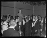 Leopold Stokowski, Philadelphia Orchestra conductor, addresses his musicians, Los Angeles, 1936