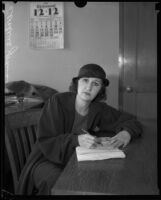 Leontine Johnson signing court papers, Los Angeles, 1928-1932