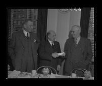 L.M. Giannini, president of Bank of America receives Financial Writers' Association Award, Los Angeles, 1950