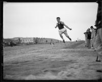 University of California athlete performing a long jump, Los Angeles, 1932