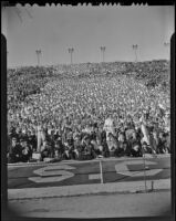 Spectators at the football game between USC and Notre Dame at the Coliseum, Los Angeles, 1938