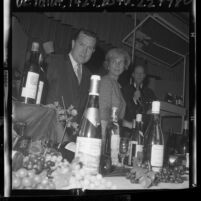 Author and restaurateur, Robert L. Blazer discussing wine at Epicure's Enterprise in Los Angeles, Calif., 1965