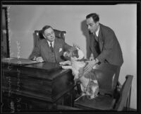 Henry Bellows presents his dog to Frank Nance, Los Angeles, 1935