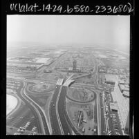 Aerial view of Los Angeles International Airport and surrounding roadways, 1966