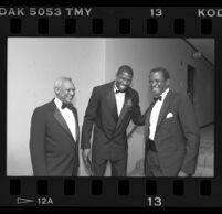 John W. Mack, Earvin "Magic" Johnson, and Sidney Poitier, Century Plaza, Century City, 1989