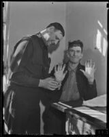 Police officer W. C. Brooks fingerprints Harper McDowell, a man with twelve fingers, Los Angeles, 1936