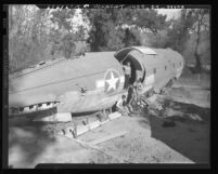 Surplus military cargo plane being transformed into a home in Riverside, Calif., 1947