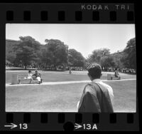 UCLA students and faculty standing in silence protest over the Vietnam War, 1966