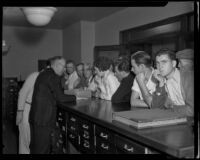 Relatives of victims of the Griffith Park fire at the morgue, Los Angeles, 1933