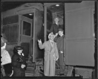 Actor Leo Carrillo, writer Frank Condon, and Los Angeles Chamber of Commerce president Robert L. McCourt boarding a train for Mexico, 1936