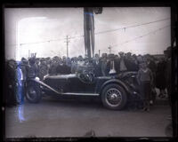 Auto show with people gathered around a car, Los Angeles, 1929