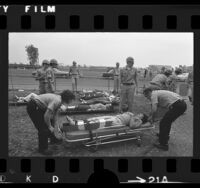 Volunteer patients being treated during earthquake disaster drill in Long Beach, Calif., 1973