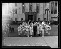 Harry Chandler with Texas Christian University Band in front of Los Angeles Times building, 1935