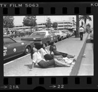 Three Canadians enjoying the sun at Los Angeles International Airport, 1978